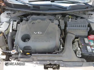 2016 Nissan Maxima SR with VIN 1N4AA6AP7GC389606, listed as a IAAI auction lot 42451614 with 114,957 mi miles and . Bid and sale history available at DreamBid. Image 10.