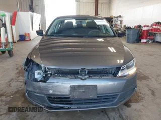 2014 Volkswagen Jetta Sedan S with VIN 3VW2K7AJ5EM410491, listed as a IAAI auction lot 42083614 with 65,960 mi miles. Bid and sale history available at carsss.com. Image 13.