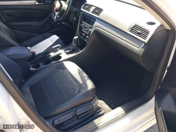 2015 Volkswagen Passat 1.8T S with VIN 1VWAT7A35FC038826, listed as a IAAI auction lot 41742799 with 123,468 mi miles. Bid and sale history available at carsss.com. Image 5.