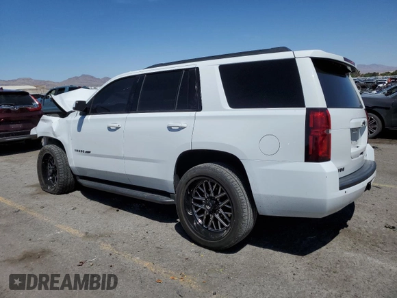 2018 Chevrolet Tahoe LS with VIN 1GNSCAKC0JR296669, listed as a Copart auction lot 54044745 with 147,457 mi miles and Salvage title. Bid and sale history available at DreamBid. Image 2.