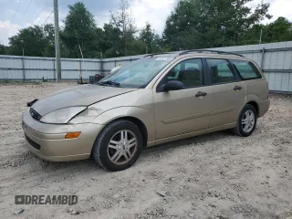 2000 Ford Focus SE with VIN 1FAFP36P7YW220648, listed as a Copart auction lot 61677985 with 141,550 mi miles and Salvage title. Bid and sale history available at DreamBid. Image 1.