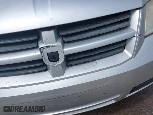 2009 Dodge Grand Caravan SE z VIN 1D8HN44E09B516847, wystawiony jako IAAI lot #42222476 z przebiegiem 190 090 mil mil oraz . Historia ofert i sprzedaży dostępna na DreamBid. Obrazek 19.