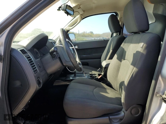 2011 Mazda Tribute Touring with VIN 4F2CY0C73BKM07056, listed as a Copart auction lot 85149404 with 138,265 mi miles and Salvage Title. Bid and sale history available at carsss.com. Image 7.