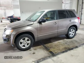 2013 Suzuki Grand Vitara Premium z VIN JS3TE0D60D4100323, wystawiony jako Copart lot #59333335 z przebiegiem 102 368 mil mil oraz Szkoda całkowita • Salvage title. Historia ofert i sprzedaży dostępna na DreamBid. Obrazek 1.