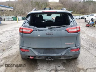 2014 Jeep Cherokee Trailhawk z VIN 1C4PJMBS1EW284275, wystawiony jako Copart lot #80191034 z przebiegiem 105 398 mil mil oraz Szkoda całkowita • Salvage title. Historia ofert i sprzedaży dostępna na DreamBid. Obrazek 6.