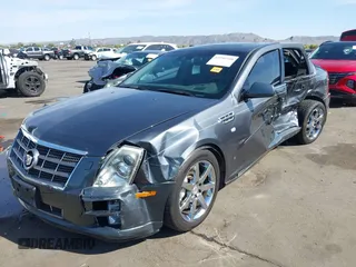 2008 Cadillac STS RWD z VIN 1G6DW67V980103498, wystawiony jako IAAI lot #41950340 z przebiegiem 92 859 mil mil oraz . Historia ofert i sprzedaży dostępna na DreamBid. Obrazek 6.