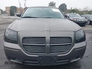 2005 Dodge Magnum RT with VIN 2D4GV58265H500284, listed as a IAAI auction lot 41194672 with 104,894 mi miles. Bid and sale history available at carsss.com. Image 6.