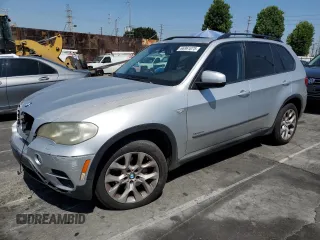 2012 BMW X5 35i z VIN 5UXZV4C58CL749363, wystawiony jako Copart lot #66961075 z przebiegiem 167 039 mil mil oraz Czysty tytuł • Clean title. Historia ofert i sprzedaży dostępna na DreamBid. Obrazek 1.
