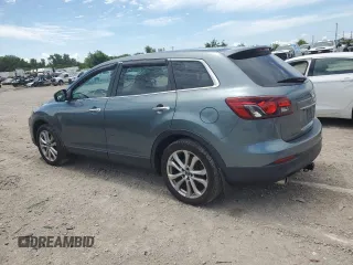 2013 Mazda CX-9 Grand Touring with VIN JM3TB3DA2D0400652, listed as a Copart auction lot 64034265 with 104,339 mi miles and Clean title. Bid and sale history available at DreamBid. Image 2.