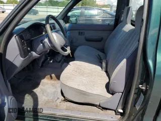 1999 Toyota Tacoma z VIN 4TANL42N5XZ453478, wystawiony jako Copart lot #56711635 z przebiegiem 197 412 mil mil oraz Szkoda całkowita • Salvage title. Historia ofert i sprzedaży dostępna na DreamBid. Obrazek 7.