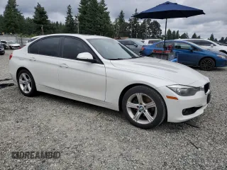 2013 BMW 3 Series 328i with VIN WBA3C1C53DF443745, listed as a Copart auction lot 62609435 with 137,573 mi miles and Salvage title. Bid and sale history available at DreamBid. Image 4.