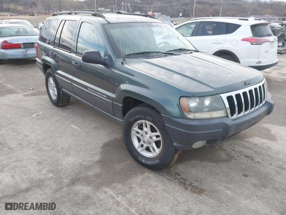 2003 Jeep Grand Cherokee Laredo with VIN 1J4GW48S93C583644, listed as a IAAI auction lot 41656314 with 256,653 mi miles. Bid and sale history available at carsss.com. Image 1.