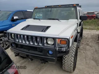 2005 Hummer H2 SUV with VIN 5GRGN23UX5H116341, listed as a Copart auction lot 76877704 with 145,778 mi miles and Salvage Title. Bid and sale history available at carsss.com. Image 5.