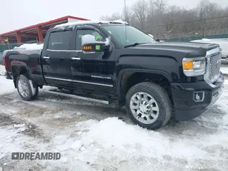 2016 GMC Sierra 2500HD Denali with VIN 1GT12UEG1GF122126, listed as a IAAI auction lot 41539099 with 56,295 mi miles and . Bid and sale history available at DreamBid. Image 1.