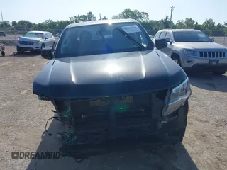2018 Chevrolet Colorado 4WD LT z VIN 1GCGTCEN0J1265248, wystawiony jako IAAI lot #42247568 z przebiegiem 74 863 mil mil oraz . Historia ofert i sprzedaży dostępna na DreamBid. Obrazek 13.
