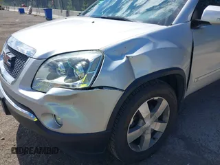 2010 GMC Acadia SLT1 z VIN 1GKLVMED1AJ139006, wystawiony jako IAAI lot #42232651 z przebiegiem 156 158 mil mil oraz . Historia ofert i sprzedaży dostępna na DreamBid. Obrazek 6.