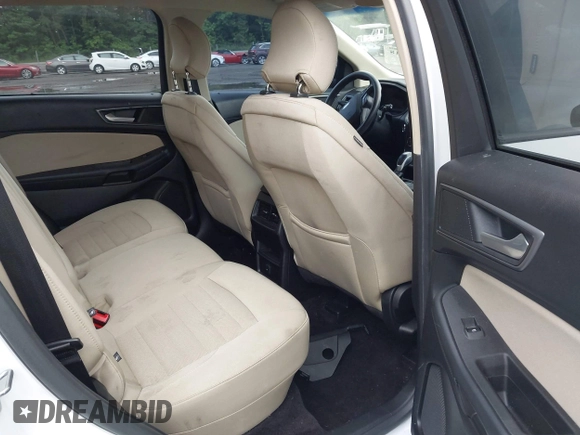2015 Ford Edge SE z VIN 2FMTK4G87FBC18076, wystawiony jako IAAI lot #42536718 z przebiegiem 180 790 mil mil oraz . Historia ofert i sprzedaży dostępna na DreamBid. Obrazek 8.