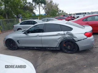 2015 BMW 4 Series 435i with VIN WBA4B1C58FG241018, listed as a IAAI auction lot 41401671 with 79,369 mi miles. Bid and sale history available at carsss.com. Image 14.