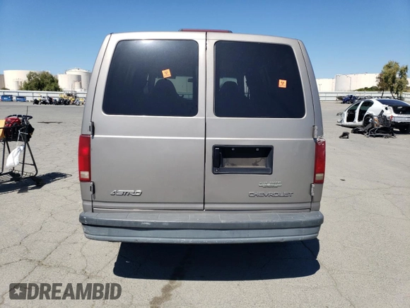 2003 Chevrolet Astro Cargo z VIN 1GCDM19X73B137764, wystawiony jako Copart lot #57367915 z przebiegiem Nie podano mil oraz Czysty tytuł • Clean title. Historia ofert i sprzedaży dostępna na DreamBid. Obrazek 6.