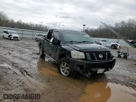 2011 Nissan Titan Pro-4X z VIN 1N6BA0EC2BN325891, wystawiony jako Copart lot #43241505 z przebiegiem Nie podano mil oraz Szkoda całkowita • Salvage title. Historia ofert i sprzedaży dostępna na DreamBid. Obrazek 10.
