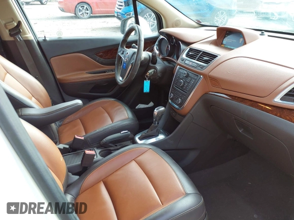 2016 Buick Encore Premium with VIN KL4CJDSB3GB607132, listed as a IAAI auction lot 41526249 with 50,617 mi miles and . Bid and sale history available at carsss.com. Image 5.