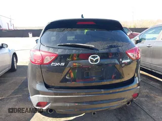 2013 Mazda CX-5 Touring with VIN JM3KE2CE3D0105660, listed as a IAAI auction lot 41876399 with 156,618 mi miles. Bid and sale history available at carsss.com. Image 16.
