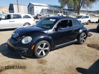2014 Volkswagen Beetle Turbo R-Line with VIN 3VWVT7AT4EM606319, listed as a Copart auction lot 70489824 with Not Provided miles and Salvage Title. Bid and sale history available at DreamBid. Image 1.