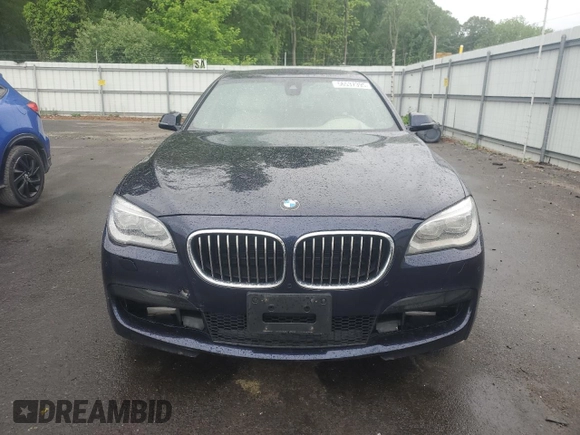 2015 BMW 7 Series 750Li z VIN WBAYE8C51FD781314, wystawiony jako Copart lot #56537395 z przebiegiem 69 682 mil mil oraz Szkoda całkowita • Salvage title. Historia ofert i sprzedaży dostępna na DreamBid. Obrazek 5.