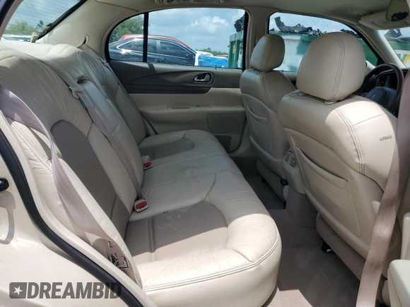 2001 Lincoln Continental z VIN 1LNHM97V91Y622267, wystawiony jako Copart lot #59915445 z przebiegiem 77 070 mil mil oraz Szkoda całkowita • Salvage title. Historia ofert i sprzedaży dostępna na DreamBid. Obrazek 10.