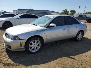 1999 Audi A4 with VIN WAUBB28DXXA299469, listed as a Copart auction lot 65596934 with 207,289 mi miles and Salvage Title. Bid and sale history available at carsss.com. Image 1.