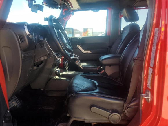 2016 Jeep Wrangler Unlimited Rubicon with VIN 1C4BJWFGXGL183011, listed as a Copart auction lot 42310535 with 165,227 mi miles and Salvage title. Bid and sale history available at DreamBid. Image 7.