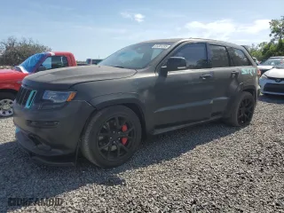 2015 Jeep Grand Cherokee SRT with VIN 1C4RJFDJXFC861588, listed as a Copart auction lot 51301235 with 35,927 mi miles and Clean Title. Bid and sale history available at carsss.com. Image 1.