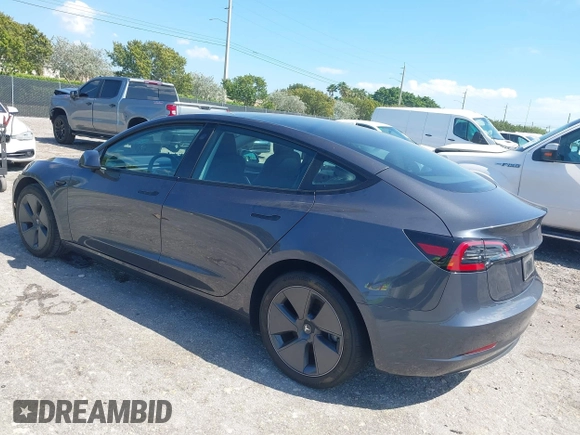 2023 Tesla Model 3 with VIN 5YJ3E1EA8PF626235, listed as a IAAI auction lot 42022893 with 30,333 mi miles and . Bid and sale history available at DreamBid. Image 3.