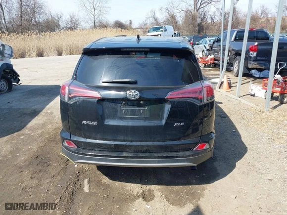 2018 Toyota RAV4 XLE with VIN 2T3WFREV6JW477658, listed as a IAAI auction lot 41706807 with 146,829 mi miles. Bid and sale history available at carsss.com. Image 16.
