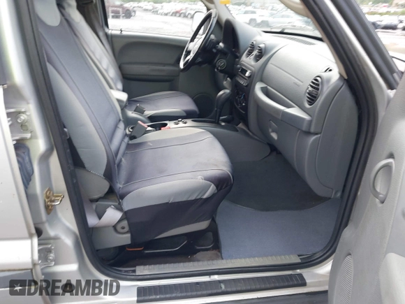2006 Jeep Liberty Sport with VIN 1J4GL48K86W158301, listed as a IAAI auction lot 42095349 with 217,187 mi miles. Bid and sale history available at carsss.com. Image 5.