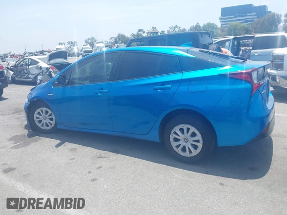 2021 Toyota Prius L Eco with VIN JTDKAMFUXM3134462, listed as a IAAI auction lot 42450931 with 89,239 mi miles and . Bid and sale history available at DreamBid. Image 14.