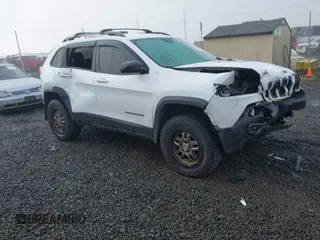 2017 Jeep Cherokee Trailhawk L Plus with VIN 1C4PJMBS2HD225011, listed as a IAAI auction lot 40802716 with 73,714 mi miles. Bid and sale history available at carsss.com. Image 1.
