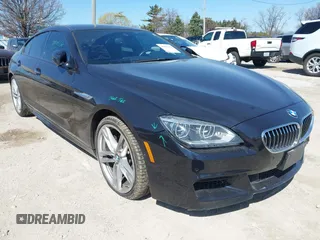 2014 BMW 6 Series 650i xDrive z VIN WBA6B4C53ED099316, wystawiony jako IAAI lot #41985133 z przebiegiem 105 943 mil mil oraz . Historia ofert i sprzedaży dostępna na DreamBid. Obrazek 1.