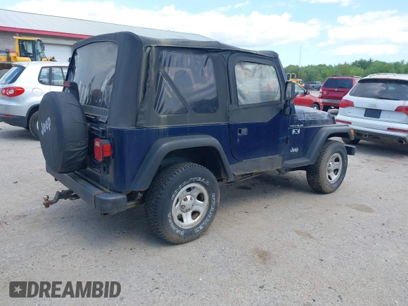 2002 Jeep Wrangler X with VIN 1J4FA39S82P735794, listed as a IAAI auction lot 42411386 with 141,219 mi miles and . Bid and sale history available at DreamBid. Image 4.