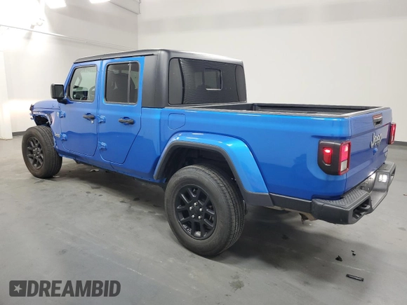 2023 Jeep Gladiator Overland z VIN 1C6HJTFG6PL564337, wystawiony jako Copart lot #59620315 z przebiegiem 31 552 mil mil oraz Czysty tytuł • Clean title. Historia ofert i sprzedaży dostępna na DreamBid. Obrazek 2.