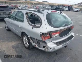 2002 Ford Taurus SE Standard with VIN 1FAFP58U82G227382, listed as a IAAI auction lot 41670977 with 66,354 mi miles. Bid and sale history available at carsss.com. Image 3.