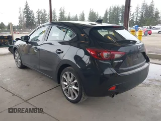 2014 Mazda 3 S Grand Touring with VIN JM1BM1M31E1150126, listed as a IAAI auction lot 41813519 with 103,578 mi miles and . Bid and sale history available at DreamBid. Image 3.