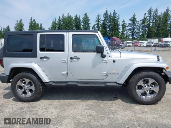 2012 Jeep Wrangler Unlimited Altitude with VIN 1C4HJWEG2CL140059, listed as a IAAI auction lot 42433563 with 189,868 mi miles and . Bid and sale history available at DreamBid. Image 13.