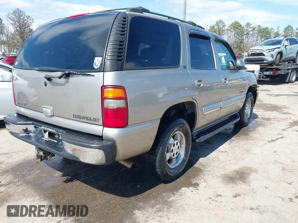 2002 Chevrolet Tahoe Z71 with VIN 1GNEK13Z32R237152, listed as a IAAI auction lot 41855170 with 141,637 mi miles. Bid and sale history available at carsss.com. Image 4.