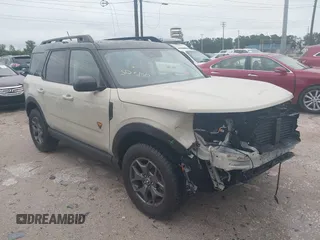 2024 Ford Bronco Sport Badlands z VIN 3FMCR9D98RRF69087, wystawiony jako IAAI lot #41984395 z przebiegiem 6 836 mil mil oraz . Historia ofert i sprzedaży dostępna na DreamBid. Obrazek 1.