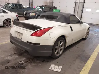 2005 Nissan 350Z Touring with VIN JN1AZ36A45M754923, listed as a IAAI auction lot 41720671 with 124,916 mi miles. Bid and sale history available at carsss.com. Image 4.