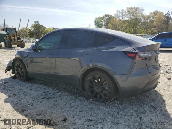 2023 Tesla Model Y Long Range z VIN 7SAYGAEE9PF662103, wystawiony jako Copart lot #51332105 z przebiegiem 35 294 mil mil oraz Szkoda całkowita • Salvage title. Historia ofert i sprzedaży dostępna na DreamBid. Obrazek 2.