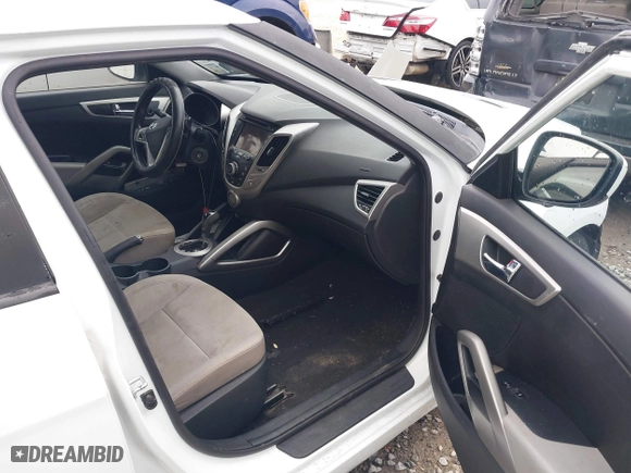2014 Hyundai Veloster with VIN KMHTC6AD7EU217470, listed as a IAAI auction lot 41286296 with 150,034 mi miles. Bid and sale history available at carsss.com. Image 5.