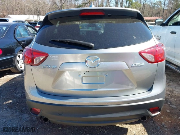 2015 Mazda CX-5 Touring with VIN JM3KE2CY0F0435575, listed as a IAAI auction lot 41652819 with 130,339 mi miles. Bid and sale history available at carsss.com. Image 16.