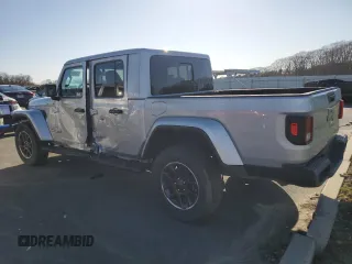 2023 Jeep Gladiator Overland z VIN 1C6HJTFG7PL531752, wystawiony jako Copart lot #52605025 z przebiegiem 55 483 mil mil oraz Czysty tytuł • Clean title. Historia ofert i sprzedaży dostępna na DreamBid. Obrazek 2.